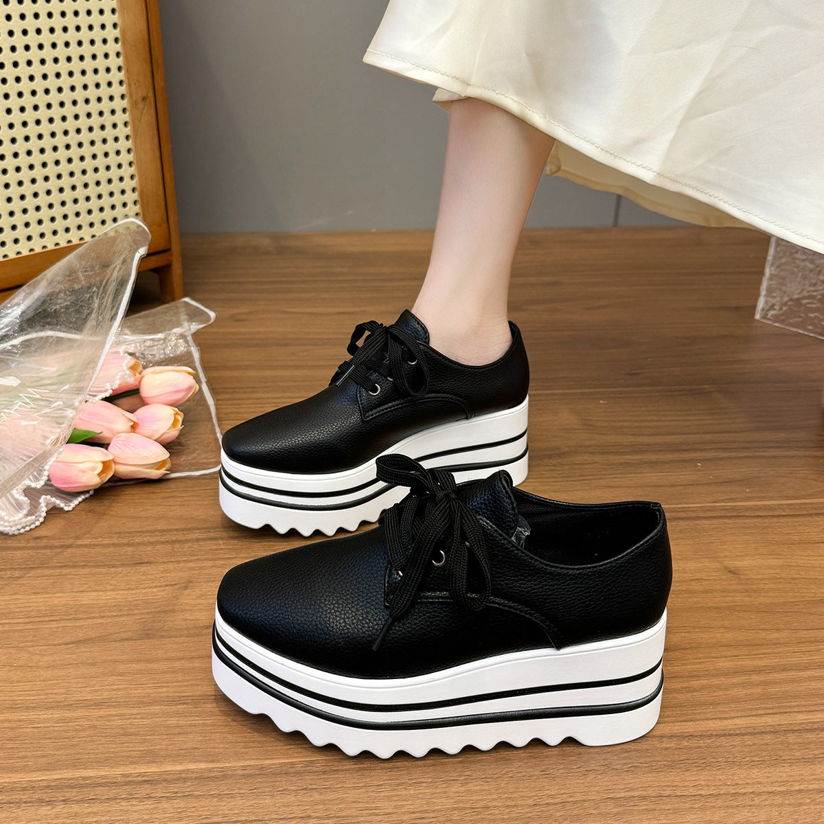 Striped loafers with lace-up straps