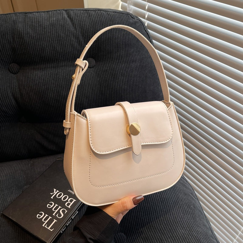 A versatile small square bag