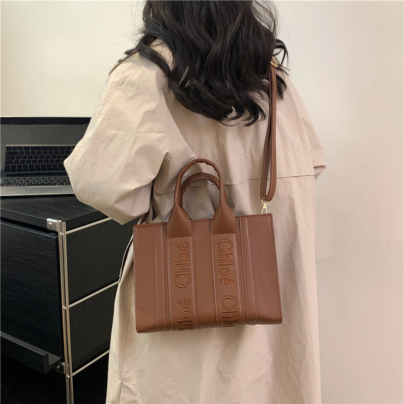 Popular letter-shaped tote bag