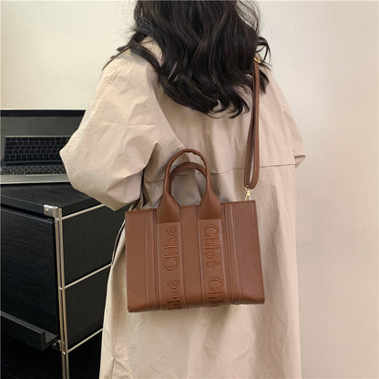 Popular letter-shaped tote bag