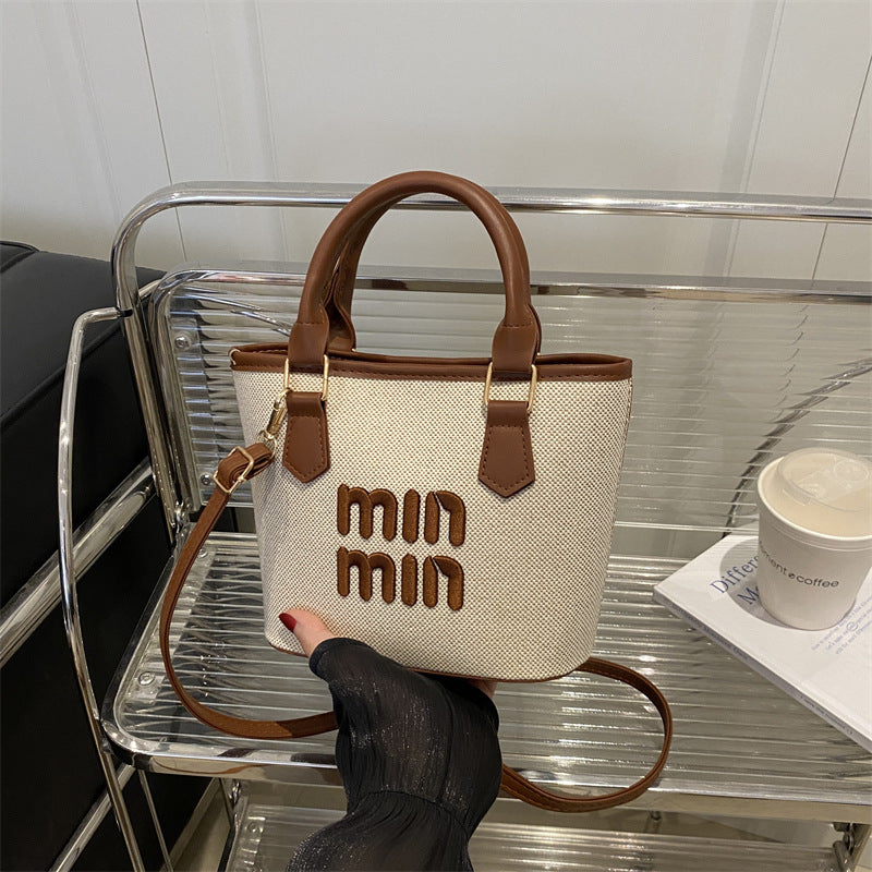 Large-capacity hand-held bucket bag