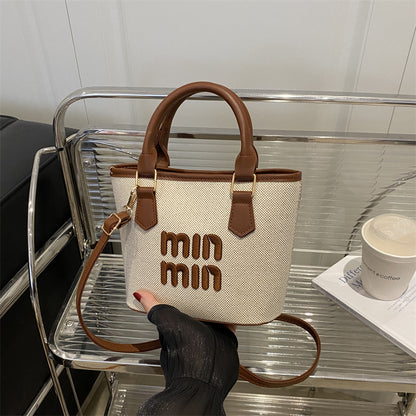 Large-capacity hand-held bucket bag