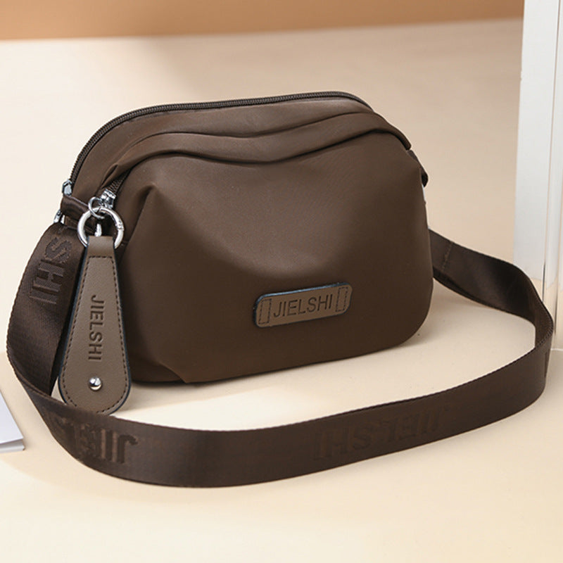 Solid-color Oxford fabric crossbody bag