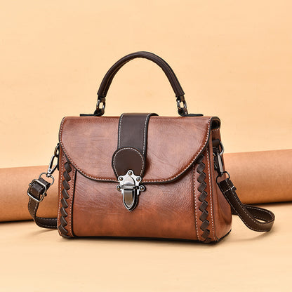 The lady is carrying a crossbody bag.