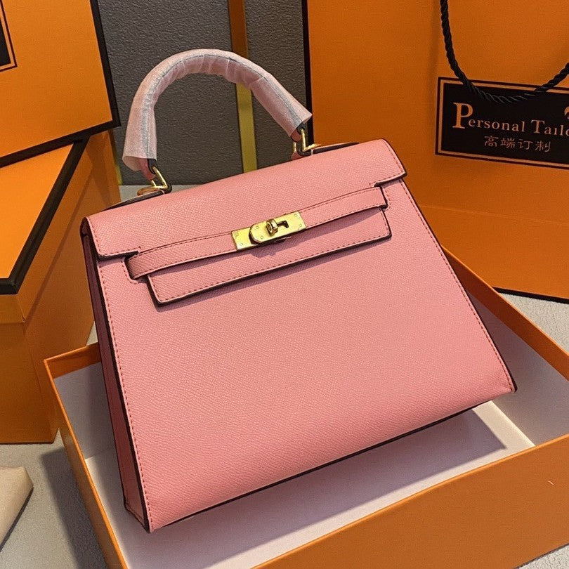 A fashionable women's handbag with a one-shoulder crossbody strap